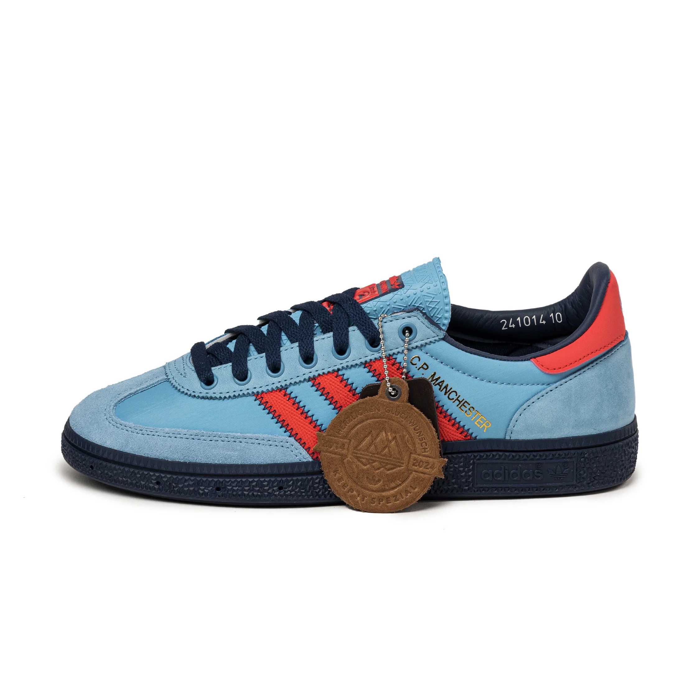 Drei Streifen SPZL x C.P. Company Manchester